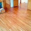 Solid Hickory wood floor with a cherry stain color.